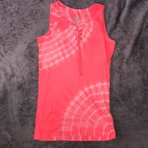 Soft pink and white tank top.